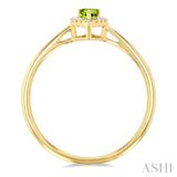 5x3 MM Pear Shape Peridot and 1/20 Ctw Single Cut Diamond Halo Semi-Precious Ring in 14K Yellow Gold