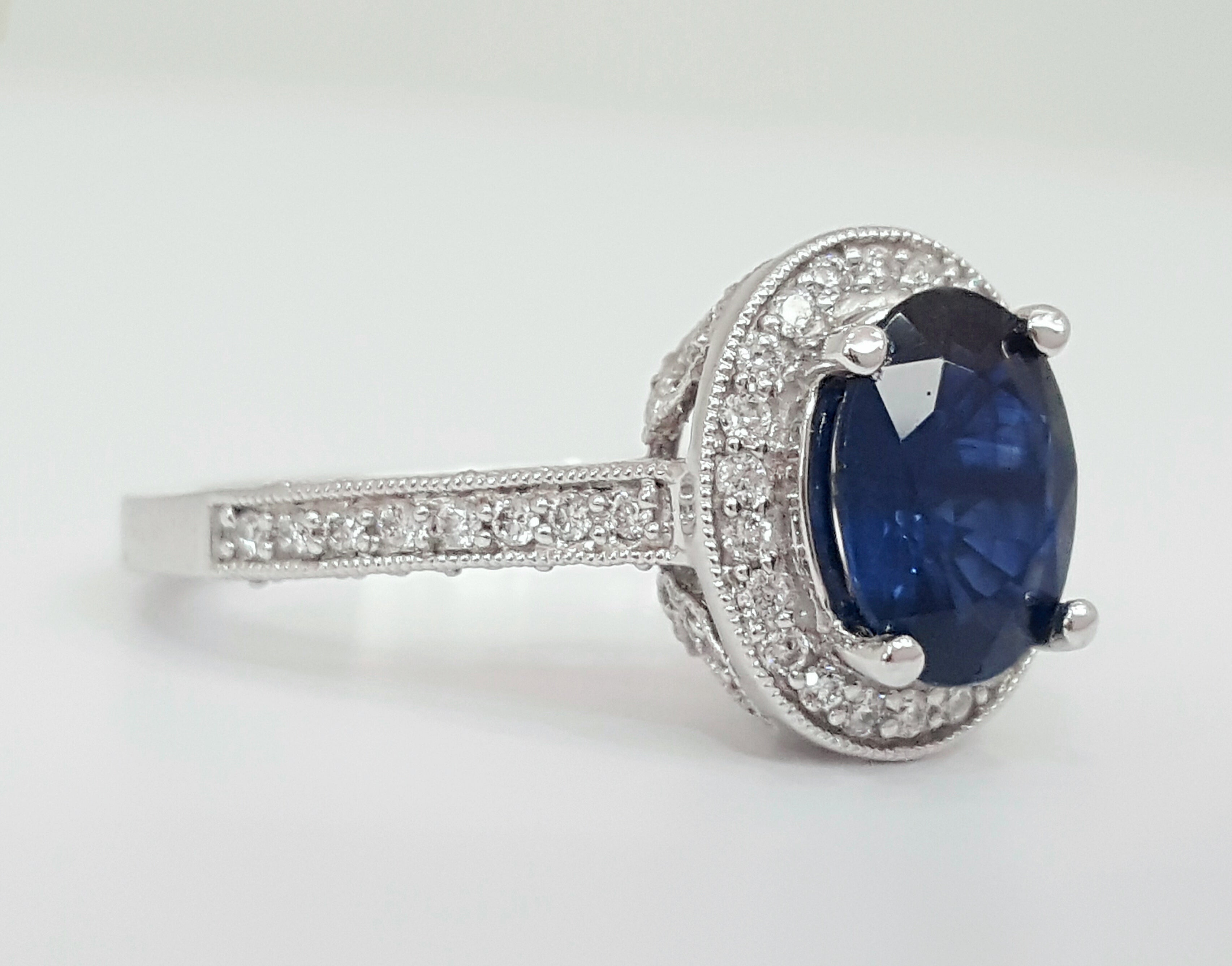 14k White Gold Oval Cut Blue Sapphire and Diamond Ring DCR-24420