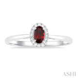 5x3 MM Oval Shape Garnet and 1/20 Ctw Single Cut Diamond Halo Semi-Precious Ring in 10K White Gold