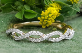 14k Yellow and White Gold .20 CTW Diamond Infinity Wedding Band DWB-24542
