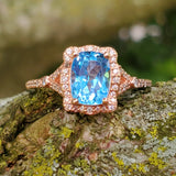 10k Rose Gold .25 CTW Blue Topaz and Diamond Ring DCR-24652