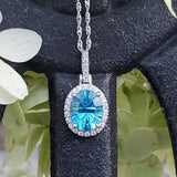 14K White Gold Diamond & Blue Topaz Oval Halo Pendant  DPD-26790
