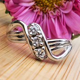 14k White Gold Three Diamond Swirl Fashion Ring - DFR-25796