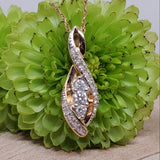 14k Gold .25 CTW 3 Diamond Infinity Swirl Pendant DPD-26852