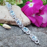 Sterling Silver Blue Topaz & Diamond Bracelet SDM-11274