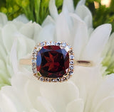 14 Karat Yellow Gold Garnet & Diamond Halo Ring DCR-24739