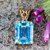 14K Yellow Gold and Blue Topaz Pendant DEJ-24692