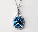 14K White Gold Diamond & Blue Topaz Oval Halo Pendant  DPD-26790