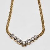 14 karat yellow gold Seven Diamond "V" Necklace DEJ-24380