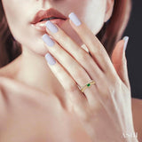 4x3 MM Oval Shape Emerald and 1/5 Ctw Round Cut DiamondsPrecious Fashion Split Twin Ring in 10K Yellow Gold