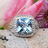 Sterlng Silver Blue Topaz & Diamond Halo Ring SDM-11205