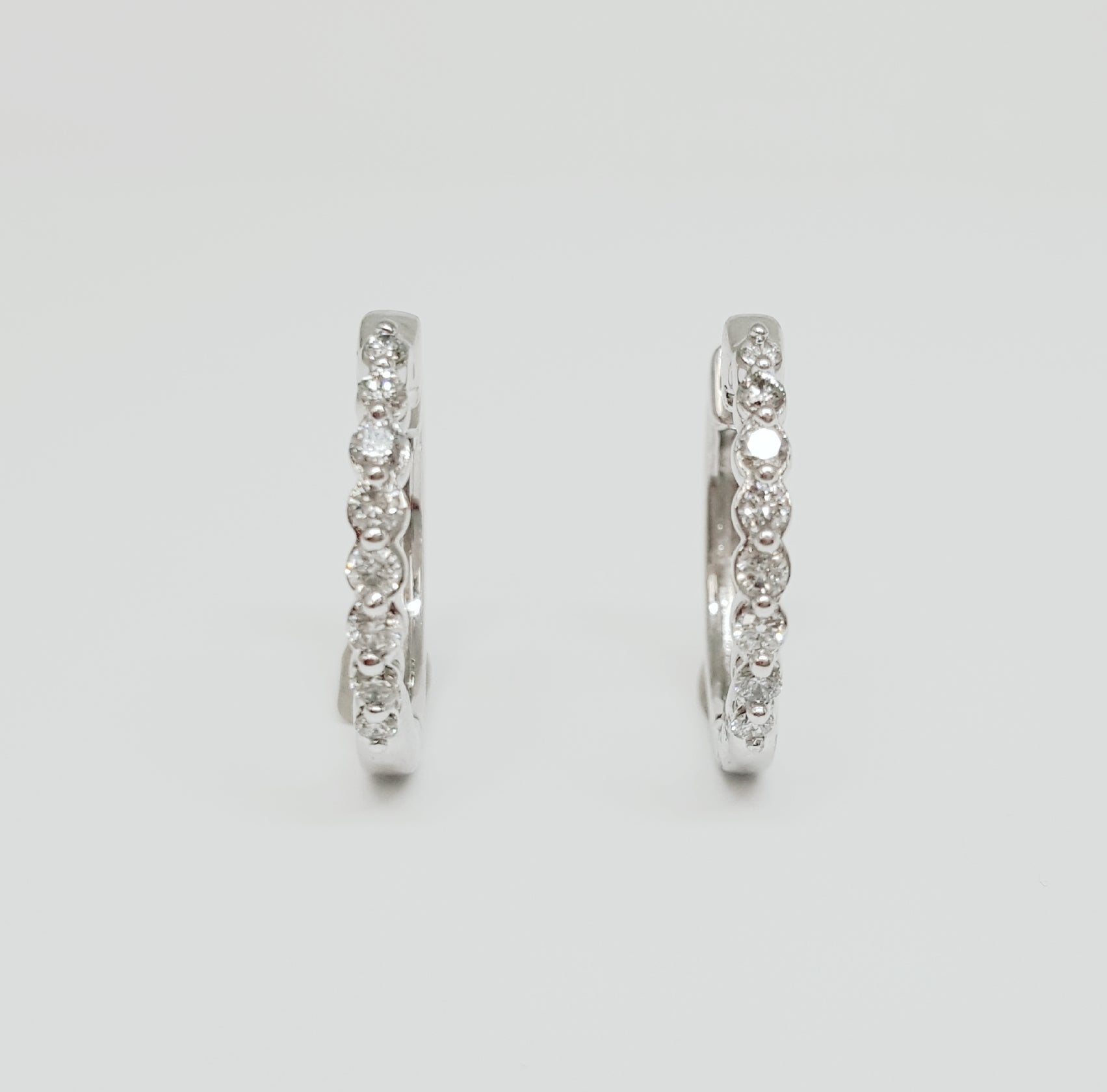 10k White Gold .25 CTW Tiny Diamond Hoop Earrings DER-25823