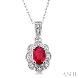 6x4mm Oval Cut Ruby and 1/20 Ctw Single Cut Diamond Pendant in 14K White Gold with Chain