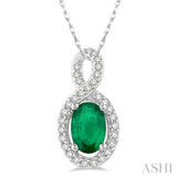 6x4 MM Oval Cut Emerald and 1/10 Ctw Round Cut Diamond Pendant in 10K White Gold with Chain