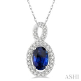 6x4 MM Oval Cut Sapphire and 1/10 Ctw Round Cut Diamond Pendant in 10K White Gold with Chain
