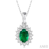 1/8 Ctw Round Cut Diamond and Oval Cut 6x4mm Emerald Center Sunflower Precious Pendant in 10K White Gold with chain