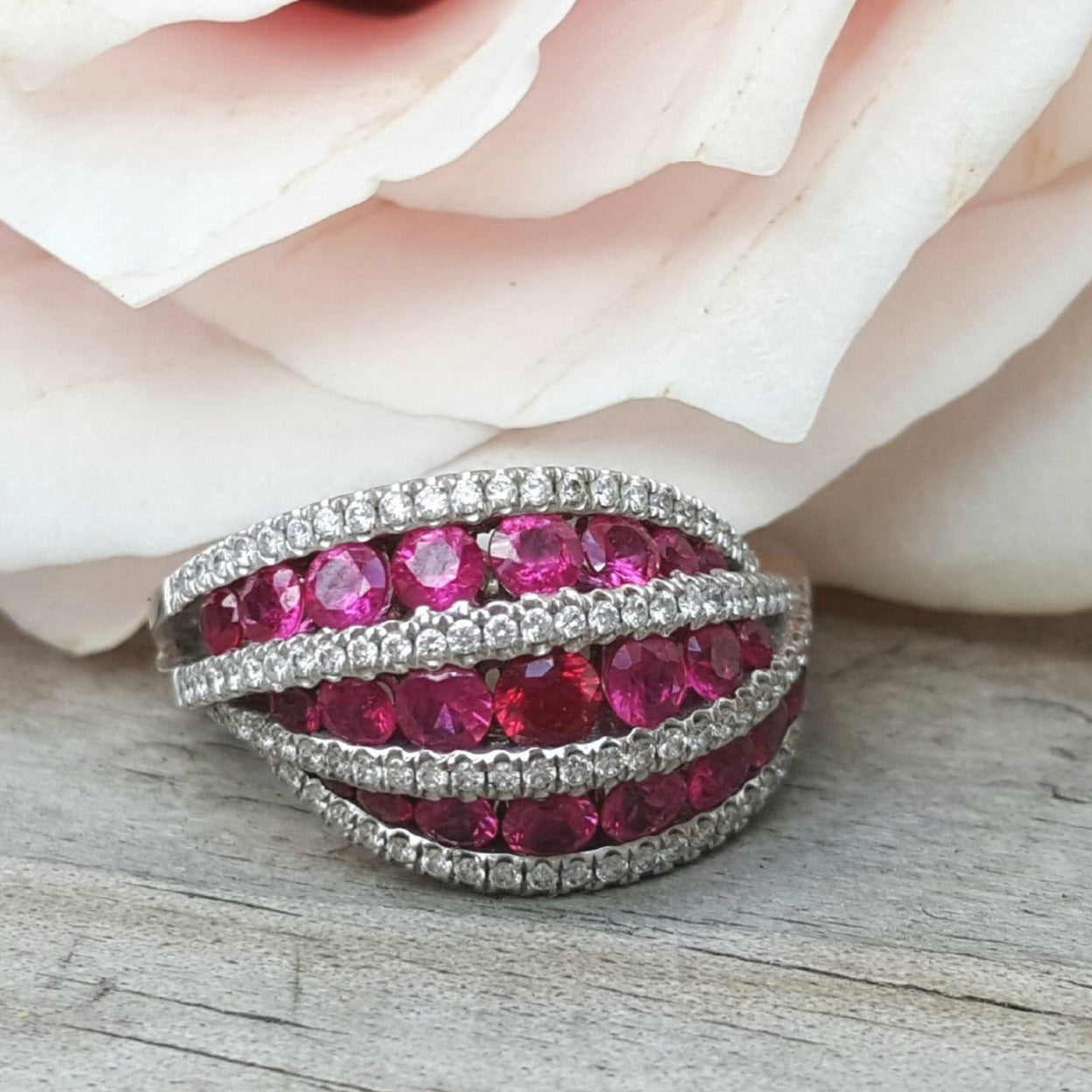 Ruby and diamond swirl ring Clearance